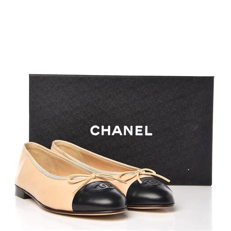 Chanel tan and black flats